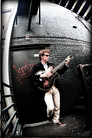 John Reed Miller on guitar