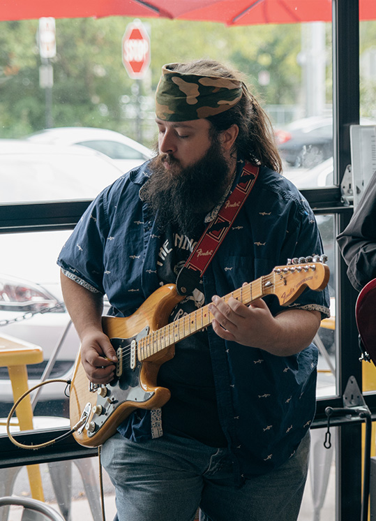 Brian Liskey on guitar