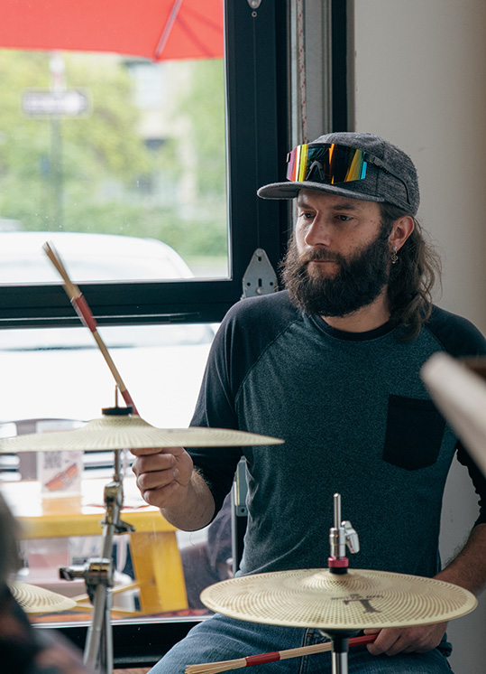 Sean Waddington on drums