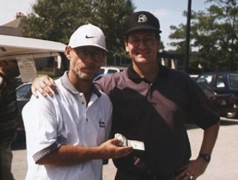 Paul Barrere settles with Red after a golf match